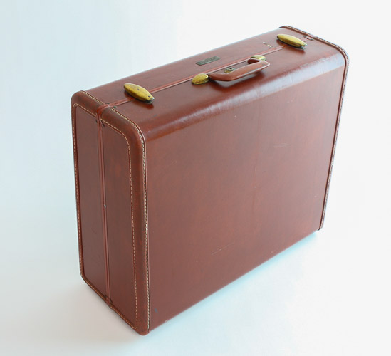 Rust Hardside Suitcase $25