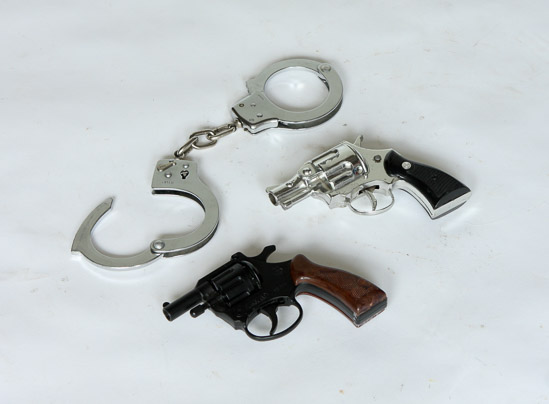 Pistols and Handcuffs $25